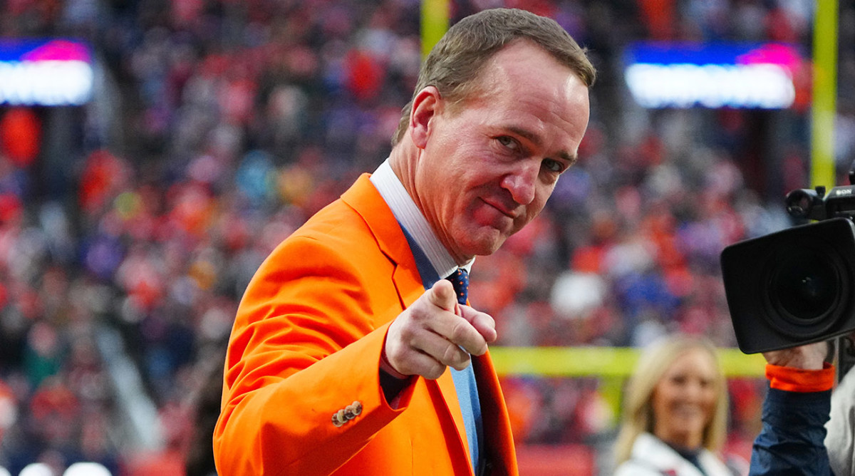 Retired American football player Peyton Manning during half time event between the Washington Football Team at Empower Field at Mile High.